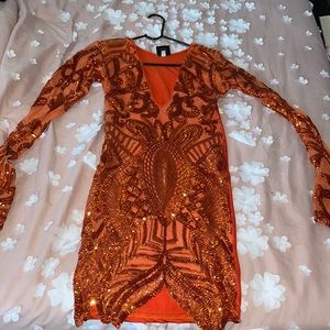 Beautiful sequin low cut thigh length dress